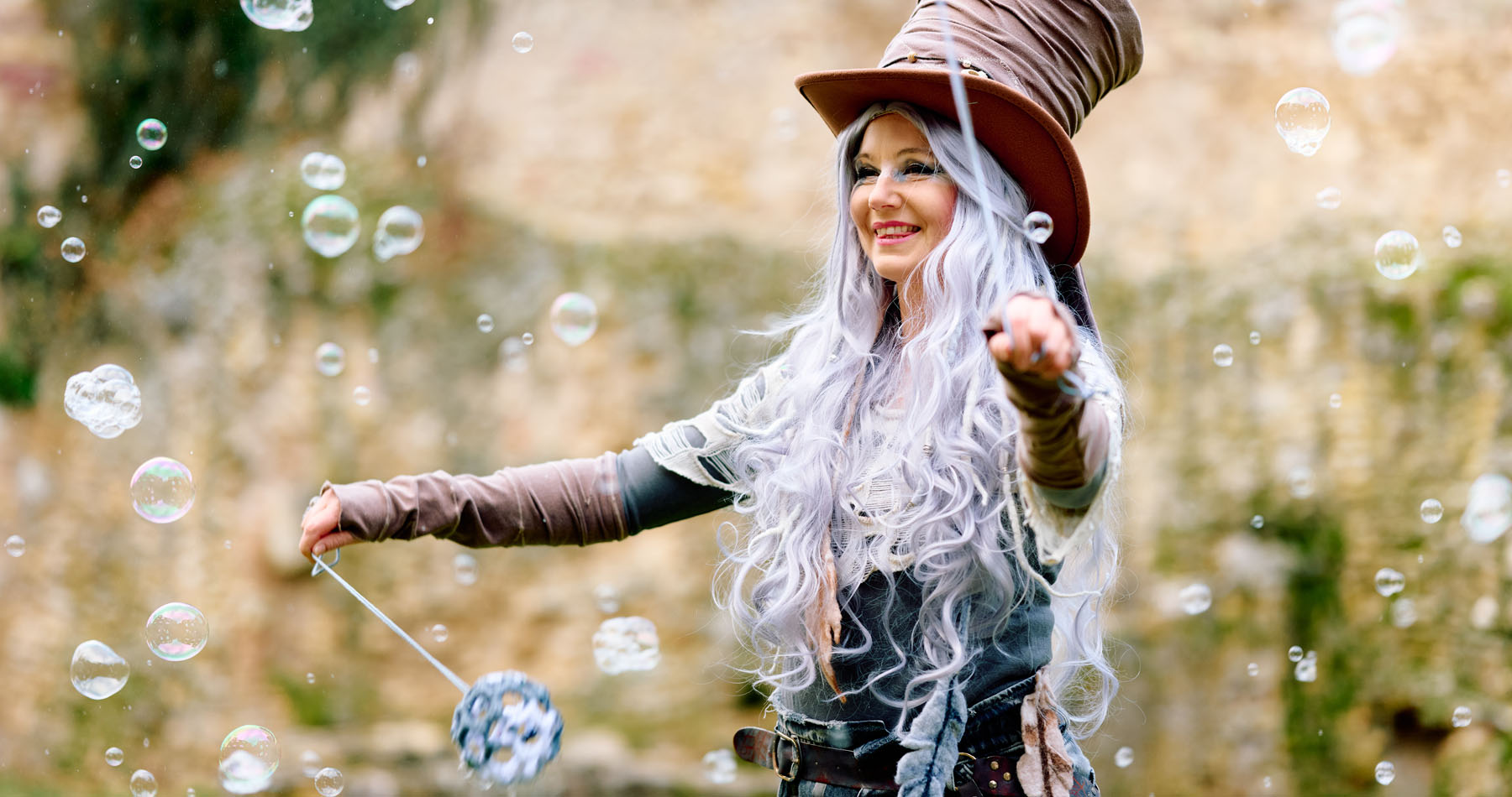 Soap bubble artist with flying soap bubbles